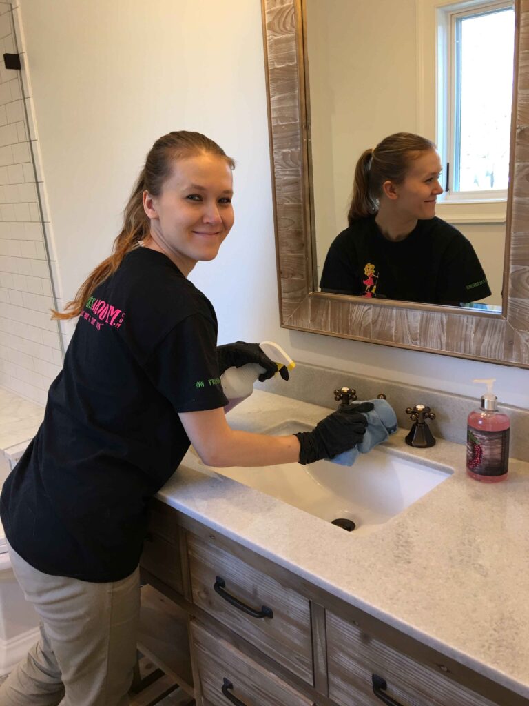 Affordable maid doing Post Construction Cleaning of Washroom